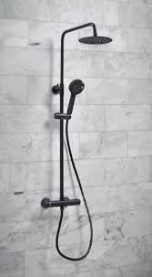 Finish Off Your Bathroom With Style And Edge With The Merano Thermostatic Mixer Shower The Plumbing Is Built Into Shower Heads Black Shower Dual Shower Heads