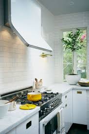 There are stainless steel appliances, including a stainless steel vent hood, which make any kitchen functional and elegant. 48 Cool Vent Hoods To Accentuate Your Kitchen Design Digsdigs