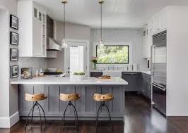 Hgtv See This Contemporary Country Kitchen With Gray And White Cabinets And A Chevron Tile Backs Distressed Kitchen Cabinets Distressed Kitchen Kitchen Layout