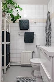 This charming white bathroom features an aegean blue vanity, marble counters, and a lot of gold accents. Small Bathroom White Vanity Bathroom Ideas Novocom Top
