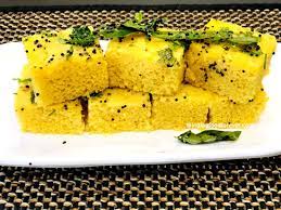 Cut into squares or triangles of required size. Gujarati Dhokla Recipe Dhokla Recipe In English Ingredients Of Dhokla