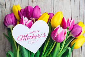 Child daughter congratulates moms and gives her flowers tulips and gift. Texts4mom Happy Mother S Day Movement Systems Physical Therapy