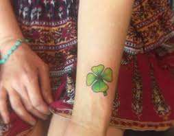 A maple leaf tattoo is a. 15 Uncommon Four Leaf Clover Tattoos And Their Which Means Nexttattoos