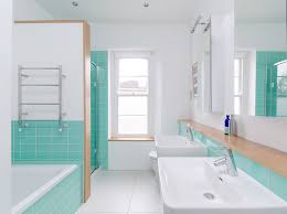 A bold turquoise powder room with brass fixtures and elegant touches. Turquoise Bathrooms Timeless And Captivating Interior