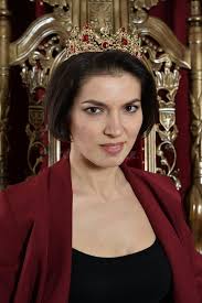 Young Queen with Bell Sitting