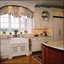 Farmhouse Style Kitchen Cabinets Have A Strong Rustic Appeal Rugged Elements And Materials In Their Kitchen Window Treatments Wood Valance Home Decor Kitchen
