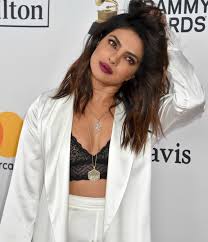 Now she has expanded her choice of clothes, bags, and shoes. Decoding Priyanka Chopra S Straight Out Of Bed Grammy Look Rediff Com Get Ahead