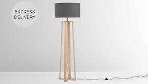 The beauty of the dexter is that the three shades (white, black and orange) fuse together beautifully to give you a distinctively warm light from three different bulbs. Asher Large Wooden Floor Lamp Natural Best Floor Standing Lights Cheap Tripod Standard Lamps