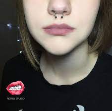 Septum Piercing With Titanium Circular Barbell