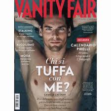Coffee table books can act like a tray or catch all for a group of accessories. Vanity Fair Italia 08 2013 Rossana Orlandi