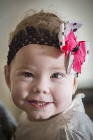 Smiling girl nominated for Tommy's award after defying all doctors'  predictions