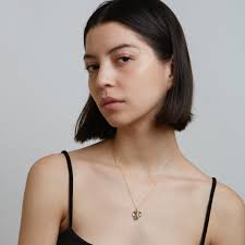 Layering Gold Vermeil Necklaces: A Trendsetter's Guide