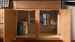 Make sure to turn off the garbage disposal—by either unplugging it under the sink or shutting off the associated breaker—before starting any maintenance. Garbage Disposal Buying Guide
