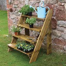 Wooden step ladder for plants. Wooden Garden Plant Ladder By Grange Internet Gardener Wooden Garden Planters Garden Ladder Garden Plant Pots