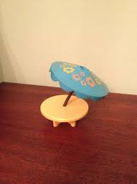 Vintage Fisher Price Yellow Patio Table With Blue Floral Umbrella Little People By Schmitysvint Vintage Fisher Price Toys Vintage Fisher Price Floral Umbrellas
