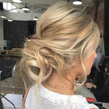 They're not as formal as intricate updos, but they take more effort than your everyday ponytail. 5 Low Bun Hairstyles We Love