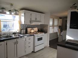 Used double wide home low cost with beige panel walls dark wood trim and a beautiful kitchen. Spruce Up Your Mobile Home With Any Of These 26 Inventive Ideas