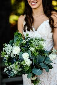 Check out this white, blue and green bridal bouquet and see more inspirational photos on theknot.com. Bridal Bouquet Greenery Foliage White And Blue Bridal Bouquet White Green Dark Green Wedding Bridal Bouquet Blue