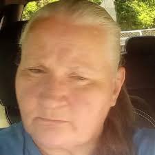 Someone is scamming George strait page !!!