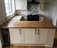 For all these vogue flat pack units. Ivory Painted Ash Shaker Kitchen Oak Worktops Precision Kitchens