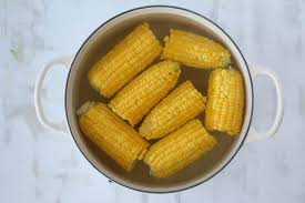 Bring the water pot to a boil, and add the ears one at a time. Boiling Corn In Milk With Fresh Or Frozen Corn Whole Lotta Yum