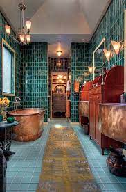 Unlike more straightforward decor styles, like industrial or bohemian, art nouveau elements can be quite hard to incorporate it into an interior. An Art Nouveau Town House Makeover Beautiful Bathrooms Copper Tub Teal Tile
