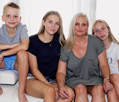 Marion barter, with her two children sally and owen. Marion Barter