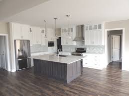 White Painted Cabinets With Grey Stained Island Stainless Steel Appliances With A Paint Cabinets White Kitchen Window Treatments Diy Painting Kitchen Cabinets