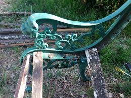 What i would suggest is that you find 5 tables in progressively smaller sizes and then saw the shortleg right back to make room for the largest of the. A Restored Iron Bench Becomes A Place For Solitude The Emerging Home
