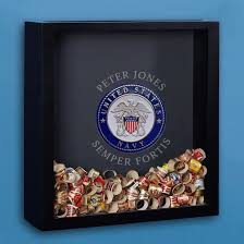 Prepare an aesthetic display that mirrors the retiree's career. 17 Ultimate Navy Retirement Gifts