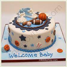 Sports themed baby shower cake done. Cakes By Maylene Sports Baby Shower Cake Sports Baby Shower Football Baby Shower Baby Boy Shower Sports