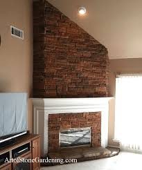 The resulting small triangles from the brick will be in. Angled Stone Fireplace On Sloped Ceiling Art Of Stone Gardening