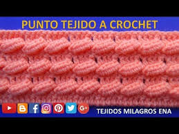 Manta tejida al crochet con cuadros grannys con centro floral en tono rosa, hojas. Punto A Crochet N 22 Para Sueter Y Bufandas Paso A Paso Manualidades