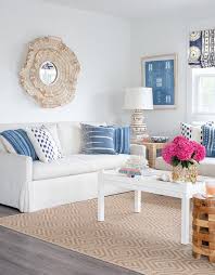 Decorative pillows go a long way in bringing any space to life and giving it the complete look. White Sofa With White Coffee Table Transitional Living Room