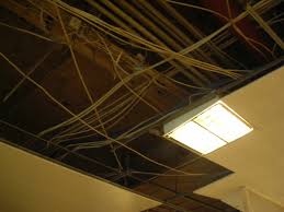 Replacing fluorescent ceiling light tubes. Troffer Wikipedia