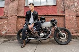 Handsome Rider Biker Man In Black Leather Jacket Jeans And Boots Stock Photo Picture And Royalty Free Image Image 82495405