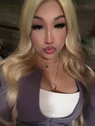 Paris Hilton Dyed Hair Blonde and Wore Blue Contacts