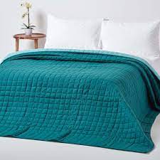 Stunning collection of bedspreads and bed throws available at dunelm today. Cotton Quilted Reversible Bedspread Teal Blue
