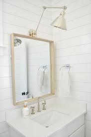 Bathroom Lighting Bathroom With Metal Shade Swing Arm Sconce Bathroom Lighting Bathroom Bathroom Lighting B Farmhouse Design Coastal Farmhouse Bathroom Sconces