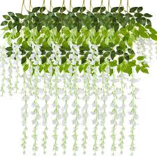 A wisteria home decor is the perfect romantic touch! Cewor 12pcs Artificial Wisteria Vine Ratta Hanging Garland Silk Flowers String For Wedding Party Home Decor White Buy Online In Albania At Desertcart