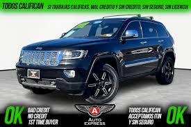 Image result for Brilliant Black 2012 Grand Cherokee