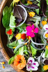 Flowers in your food is usually reserved for wedding cakes and gourmet restaurants but there may be lots of edible arrangements in your garden right now. Spring Salad With Edible Flowers The View From Great Island
