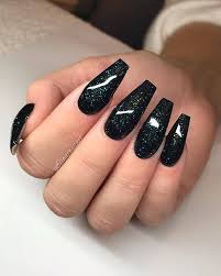 Coffin nails can come in a myriad of colors, designs, shapes, shades, and the list continues. 50 Cool Long Nail Designs That Are Easy To Create Black Nails With Glitter Long Nail Designs Black Nail Designs