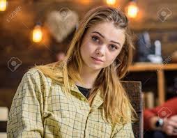 Maybe you would like to learn more about one of these? Girl With Long Blond Straight Shining Hair Posing Indoors Beautiful Teenage Model Wearing Boyish Oversize Shirt Female With Big Green Eyes And Full Lips Innocence Of Childhood Concept Stock Photo Picture And