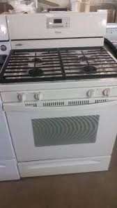 30 inch freestanding gas range with 4 open burners, 3.9 cu ft oven, broiler drawer, electronic ignition, electronic clock/timer, 4 inch porcelain backguard and ada compliant: Whirlpool Gas Bisque 4 Burner Gas Stove Auction 3 K Bid