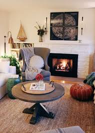 Paint walls white or in a neutral color cued by views outside the windows. Warm Cozy Room Fireplace Insert Reveal Room Inspiration Cozy Room Fireplace Inserts