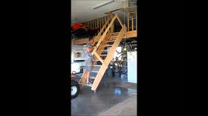 Majic stairs allow you to safely access your attic storage space with the touch of a button. Rolling Garage Stairs Wmv Youtube