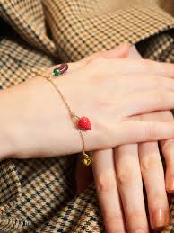 A red heart charm adds a pop of color to . Multicoloured Fruits Beaded Bracelet Charles Keith De