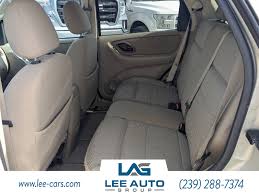 Image result for Gold Ash 2005 Escape