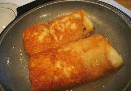Saganaki Usually You Finish With A Splash Of Ouzo Or Metaxa Brandy And Serve It Flaming At The Table Be Sure To Have F Greek Recipes Recipes Greek Dishes